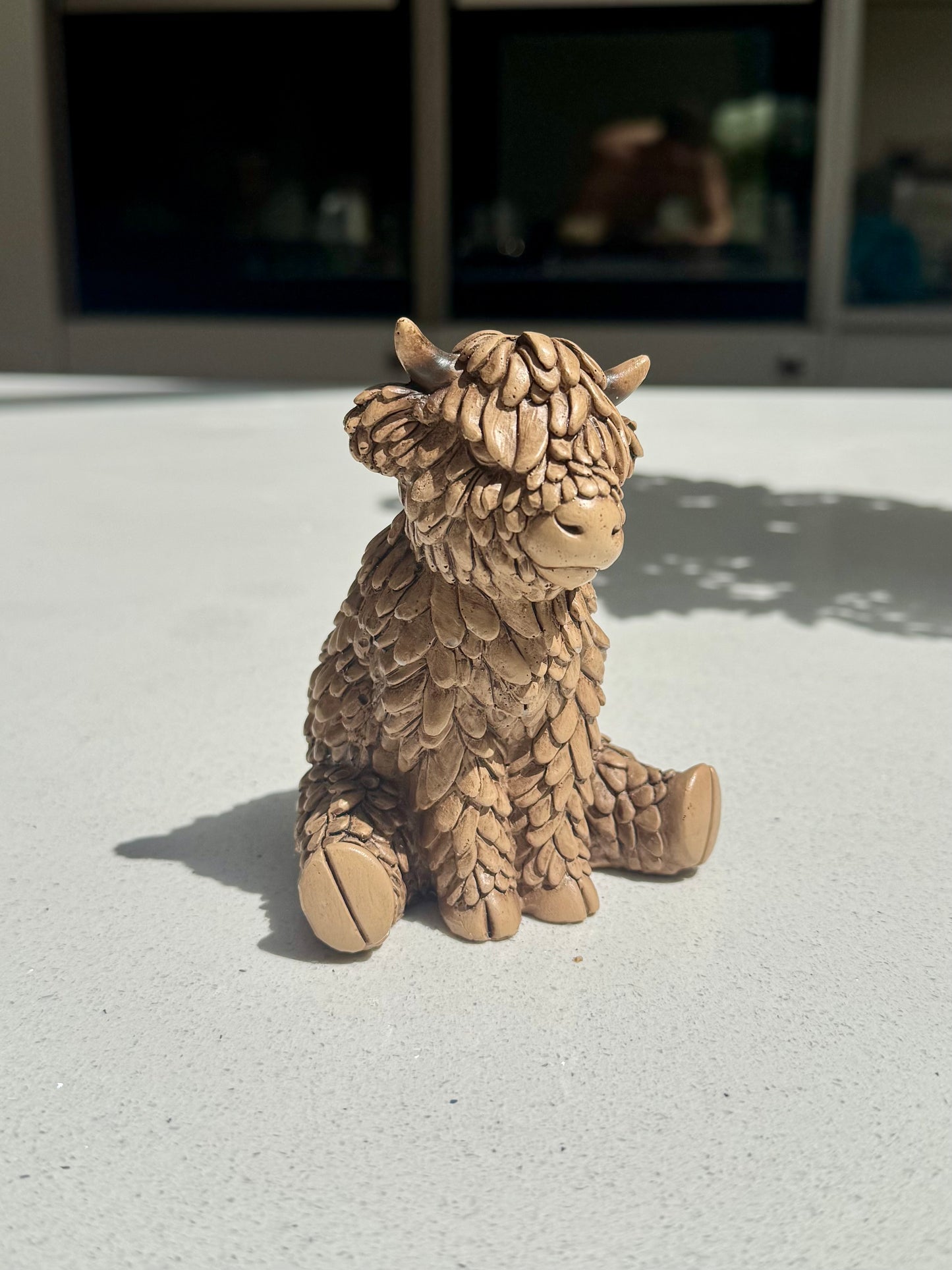 Sitting Highland Cow Ornament