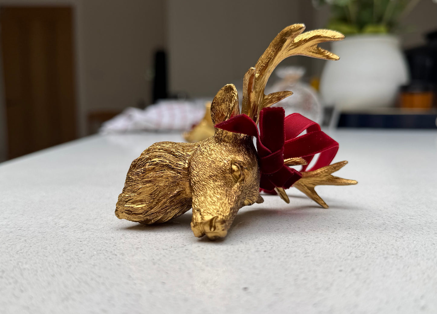 Gold Resin Stag Head Bauble with Red Velvet Bow