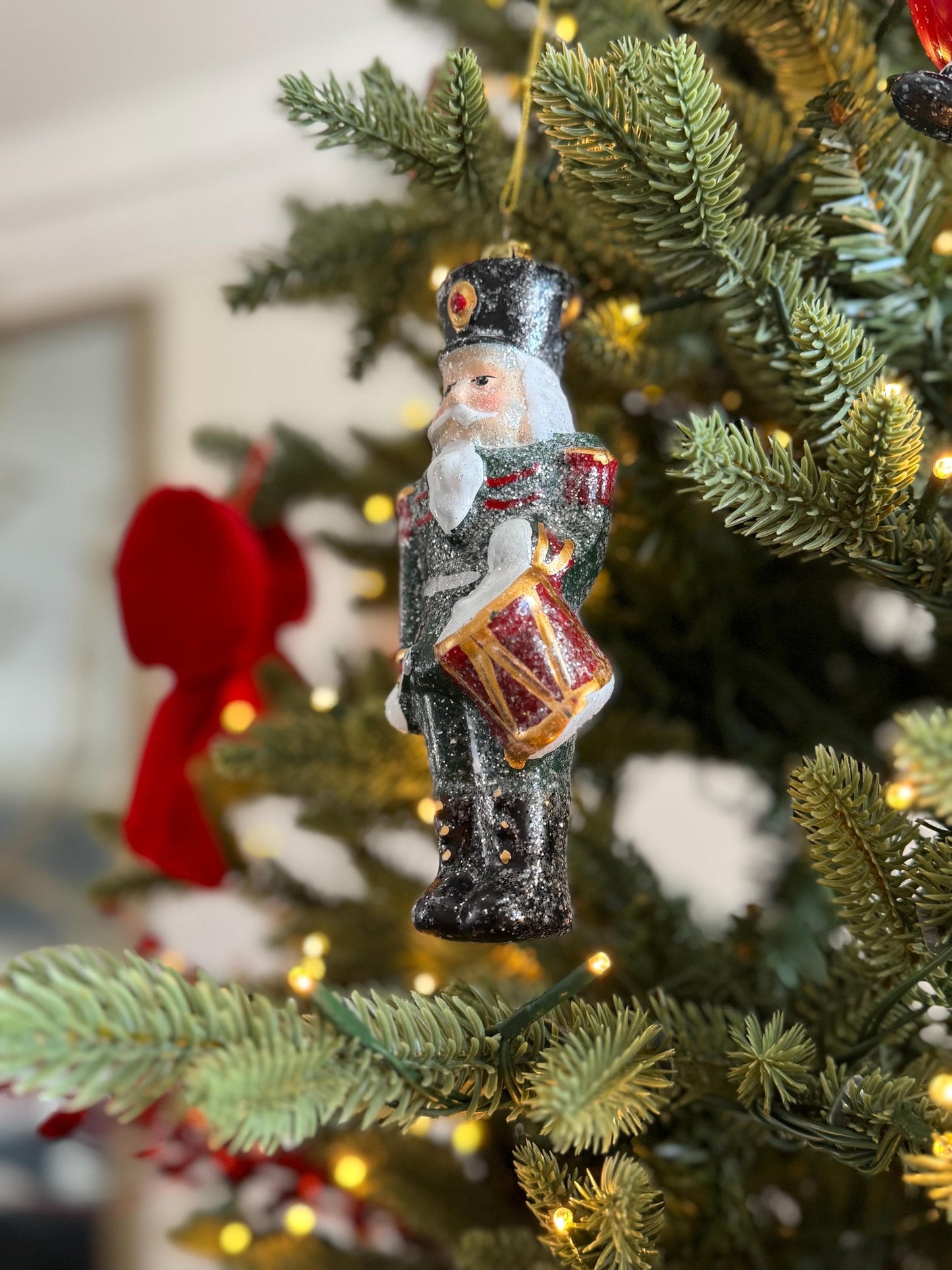 Nutcracker Drummer Christmas Bauble in Glittery Green