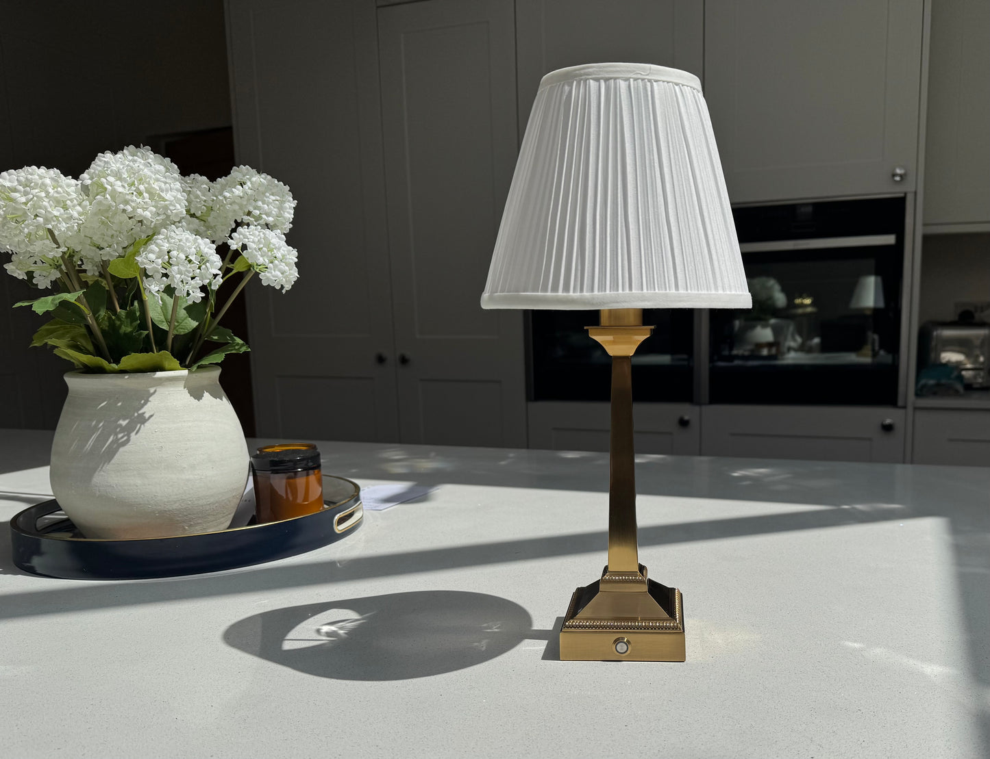 Mayfair cordless bedside table lamp in brushed gold and white, perfect for bedrooms and console tables