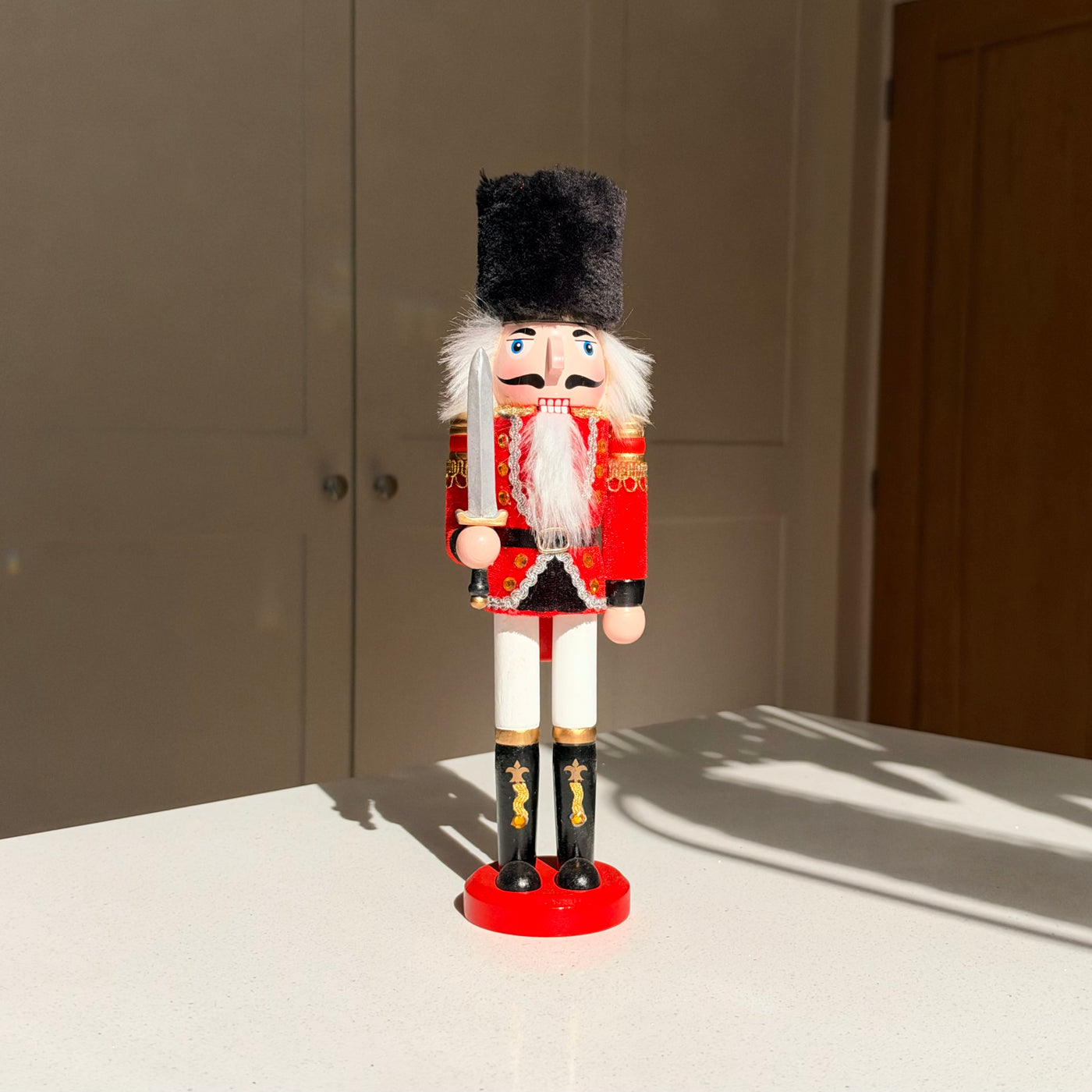 The Scarlet Sentinel – Handmade Wooden Guardsman Nutcracker with Sword, 30cm