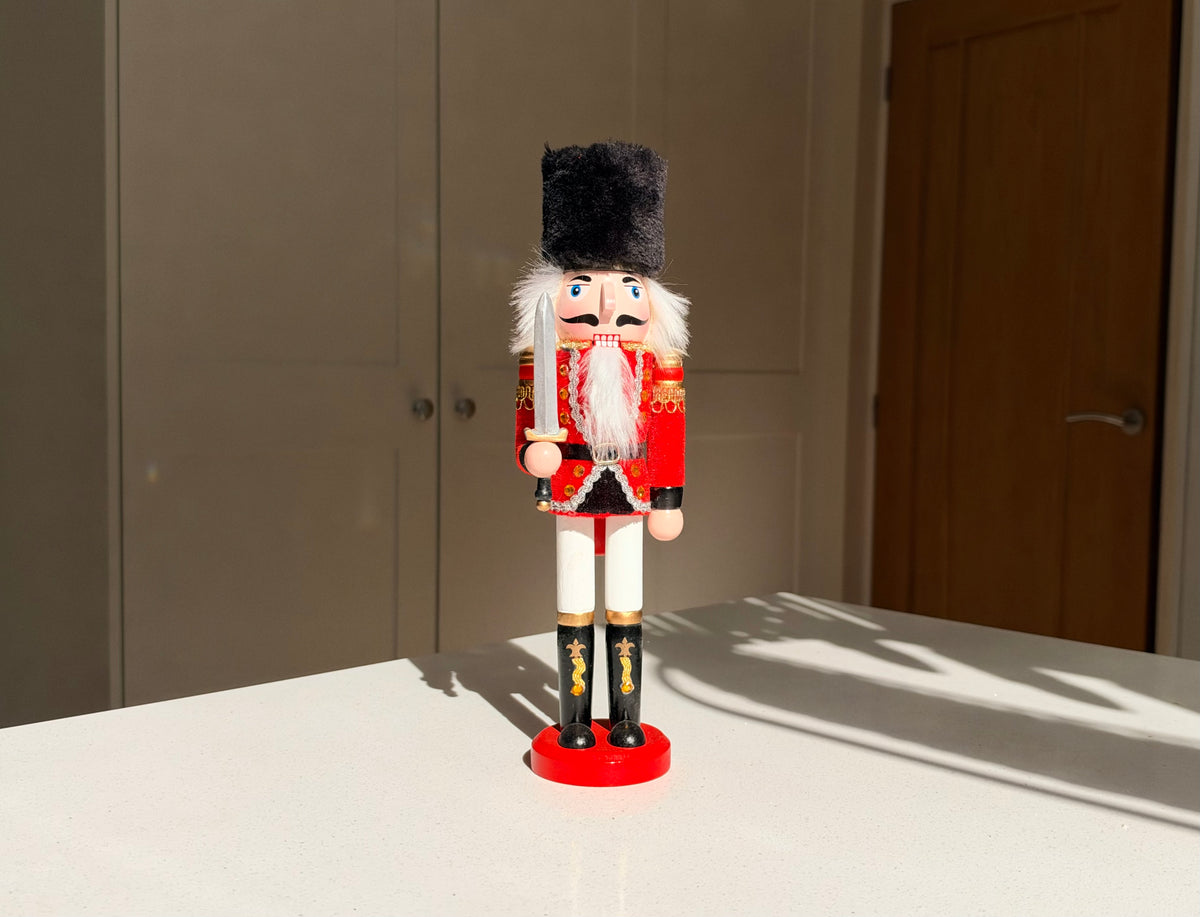 The Scarlet Sentinel – Handmade Wooden Guardsman Nutcracker with Sword, 30cm