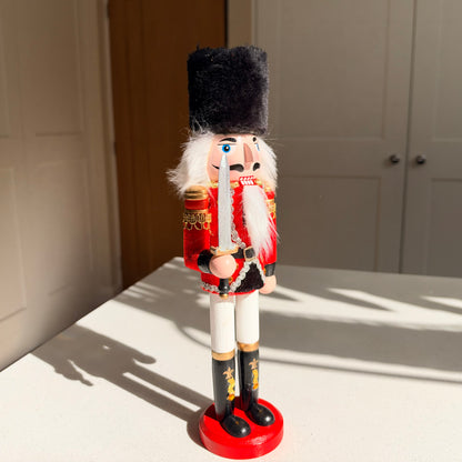 The Scarlet Sentinel – Handmade Wooden Guardsman Nutcracker with Sword, 30cm