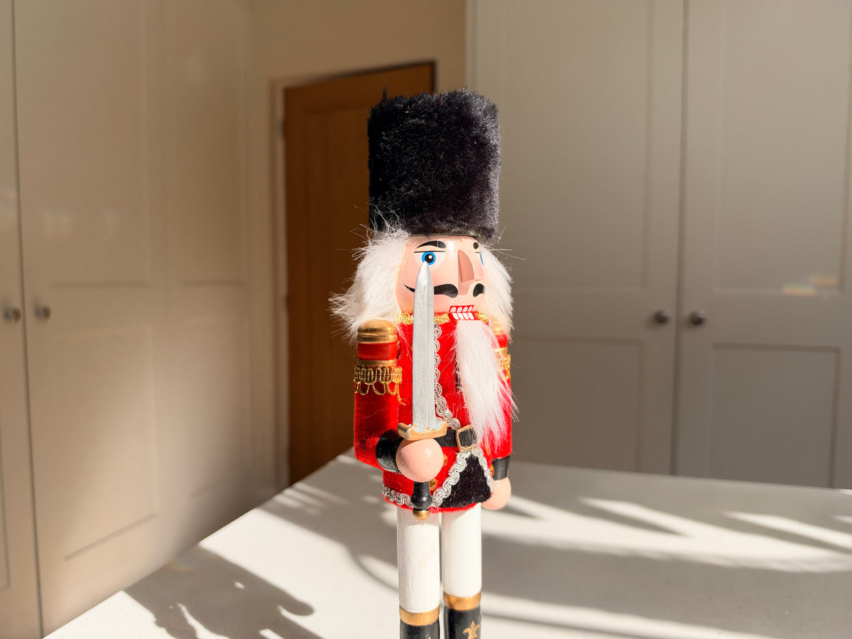 The Scarlet Sentinel – Handmade Wooden Guardsman Nutcracker with Sword, 30cm