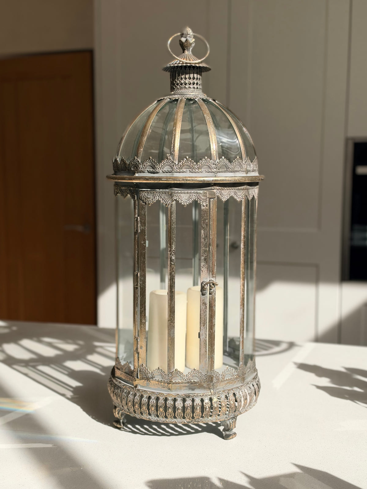 Extra large antique gold lantern with ornate glass panels