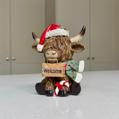 Festive Highland Cow Ornament with Welcome Sign – 14cm
