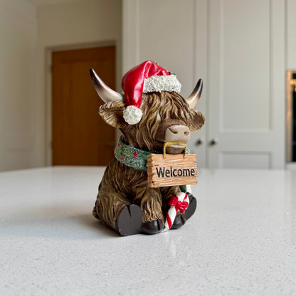 Festive Highland Cow Ornament with Welcome Sign – 14cm