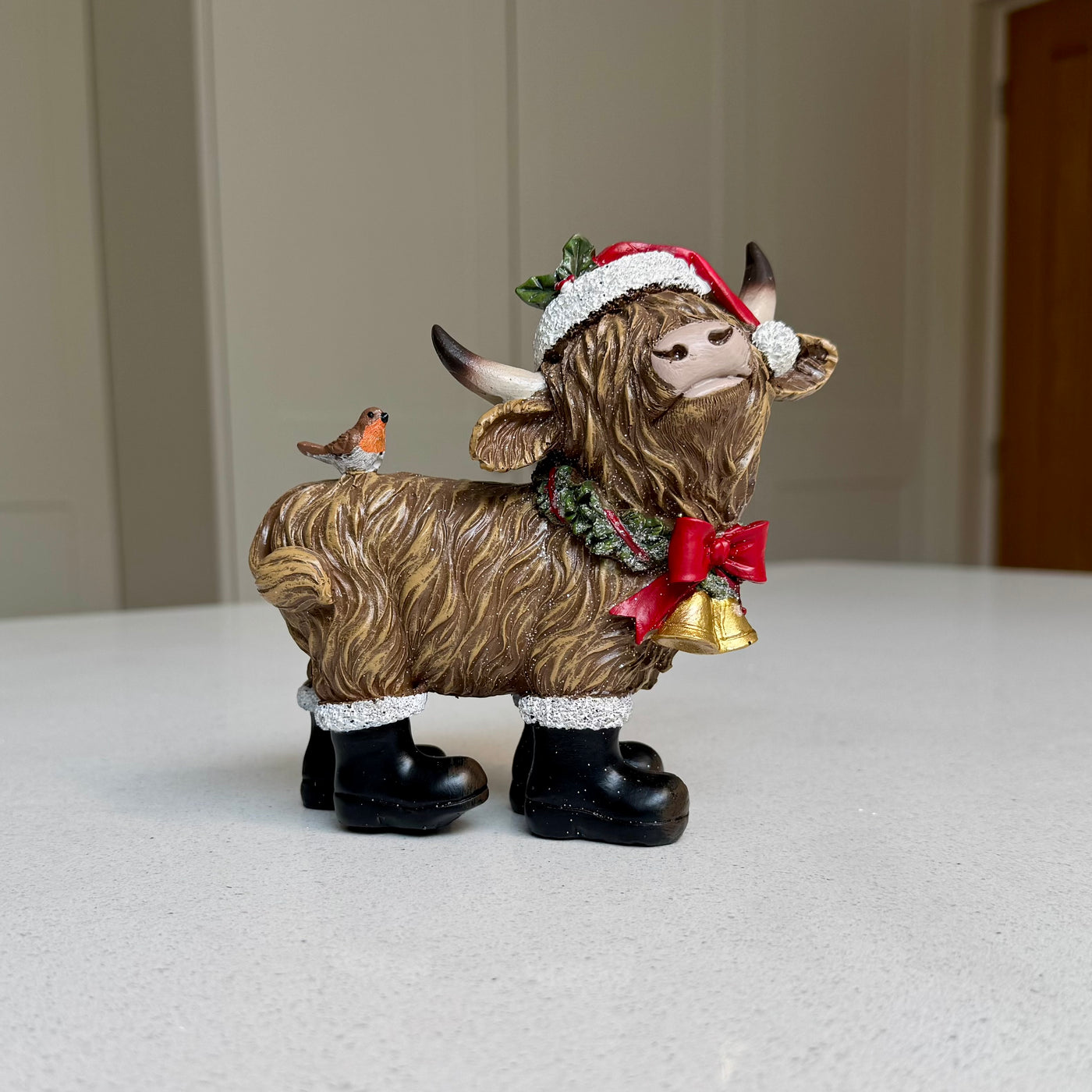 Festive Highland Cow Ornament with Robin and Bells – 14cm
