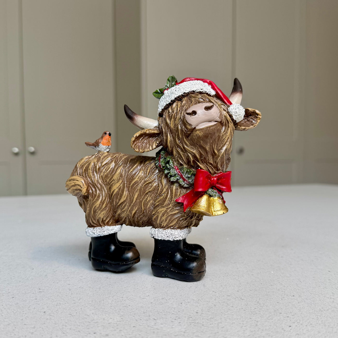 Festive Highland Cow Ornament with Robin and Bells – 14cm