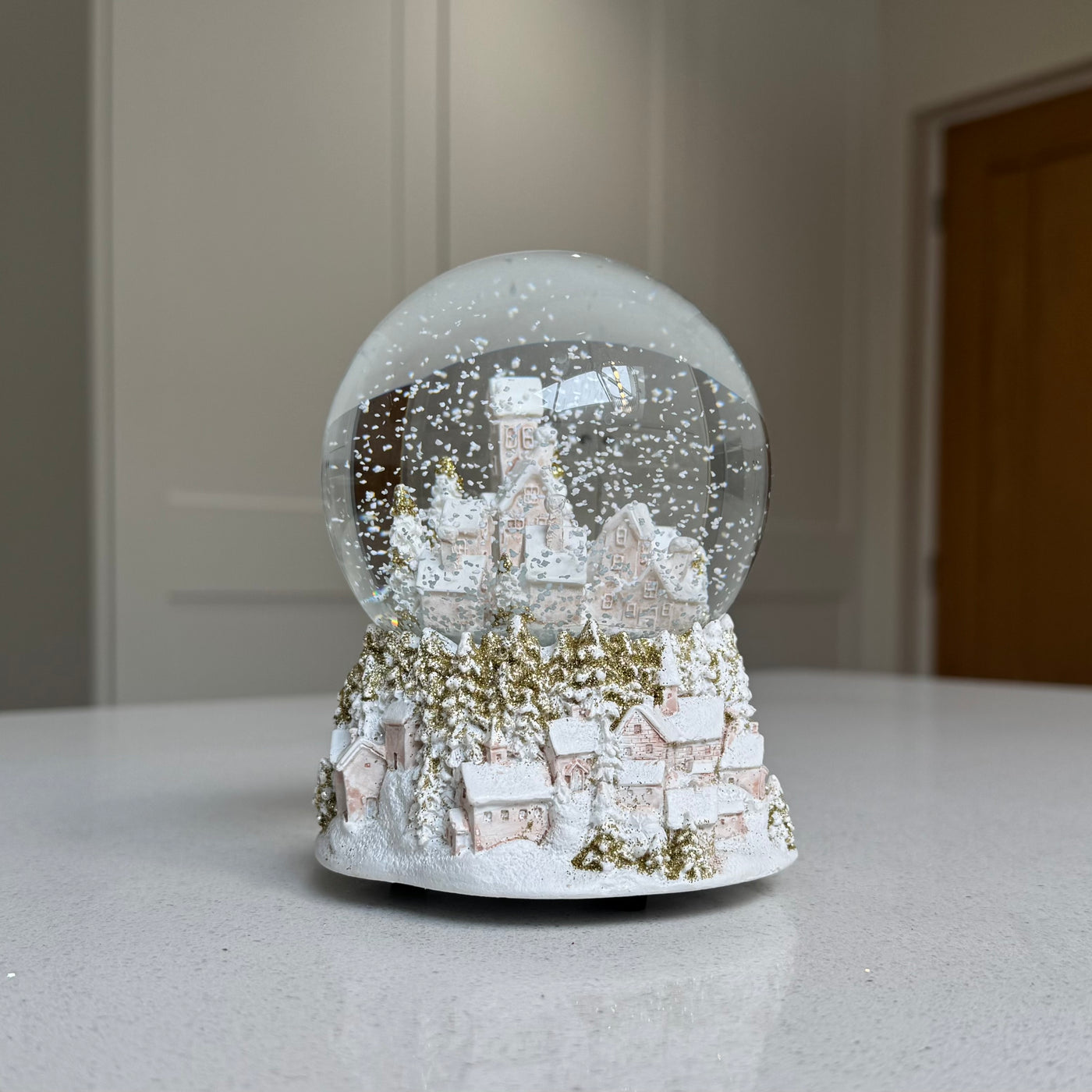 Musical Pink & Glittered Gold Townscape Snow Globe – 14cm