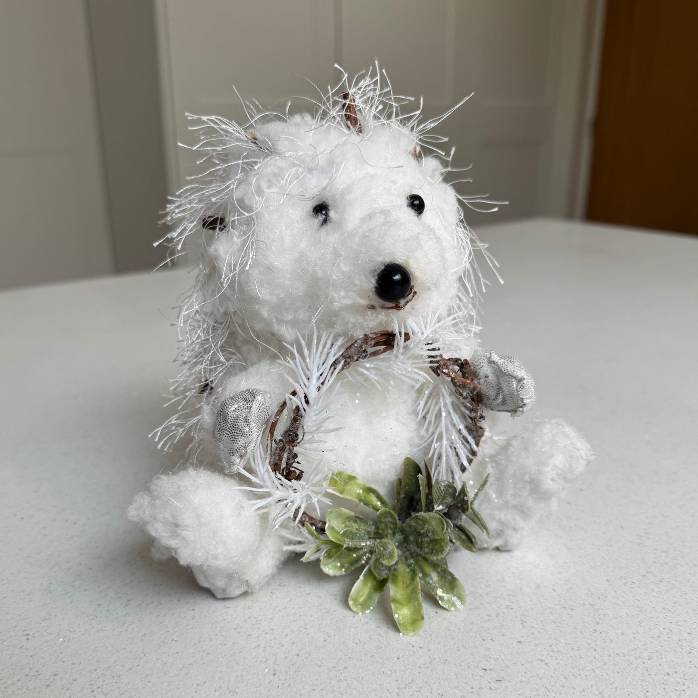 White Festive Hedgehog Ornament Holding a Wreath – 17cm
