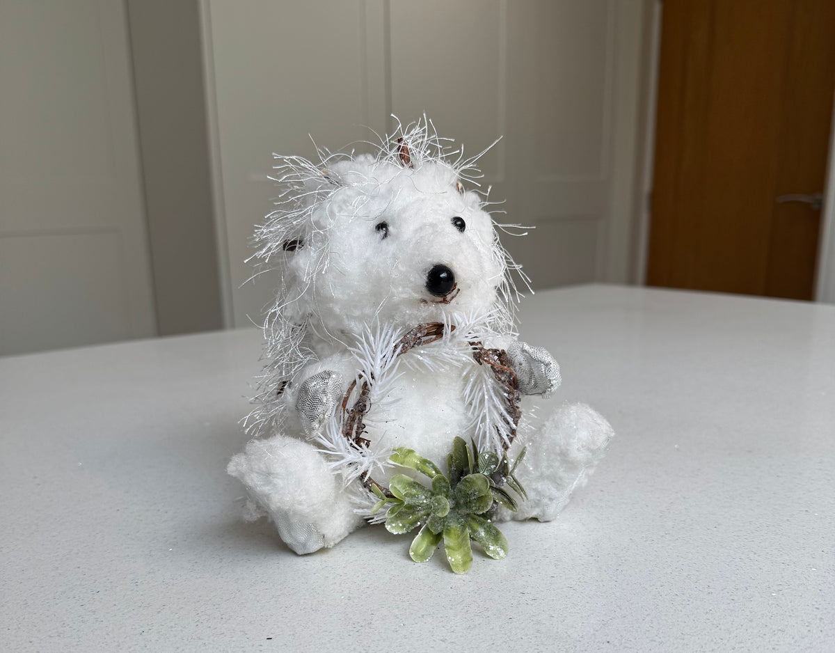 White Festive Hedgehog Ornament Holding a Wreath – 17cm