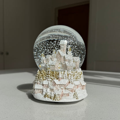 Musical Pink & Glittered Gold Townscape Snow Globe – 14cm