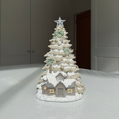Snowy light-up Christmas house and tree decoration