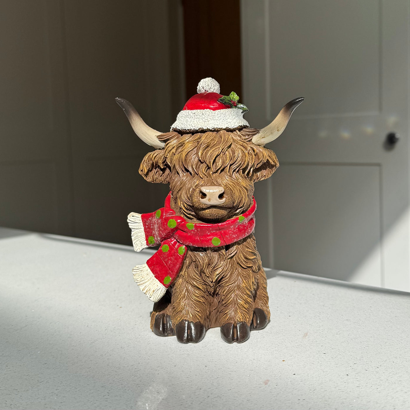 Festive Highland Cow Ornament with Red Scarf and Santa Hat – 17cm