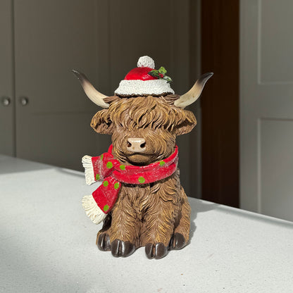Festive Highland Cow Ornament with Red Scarf and Santa Hat – 17cm