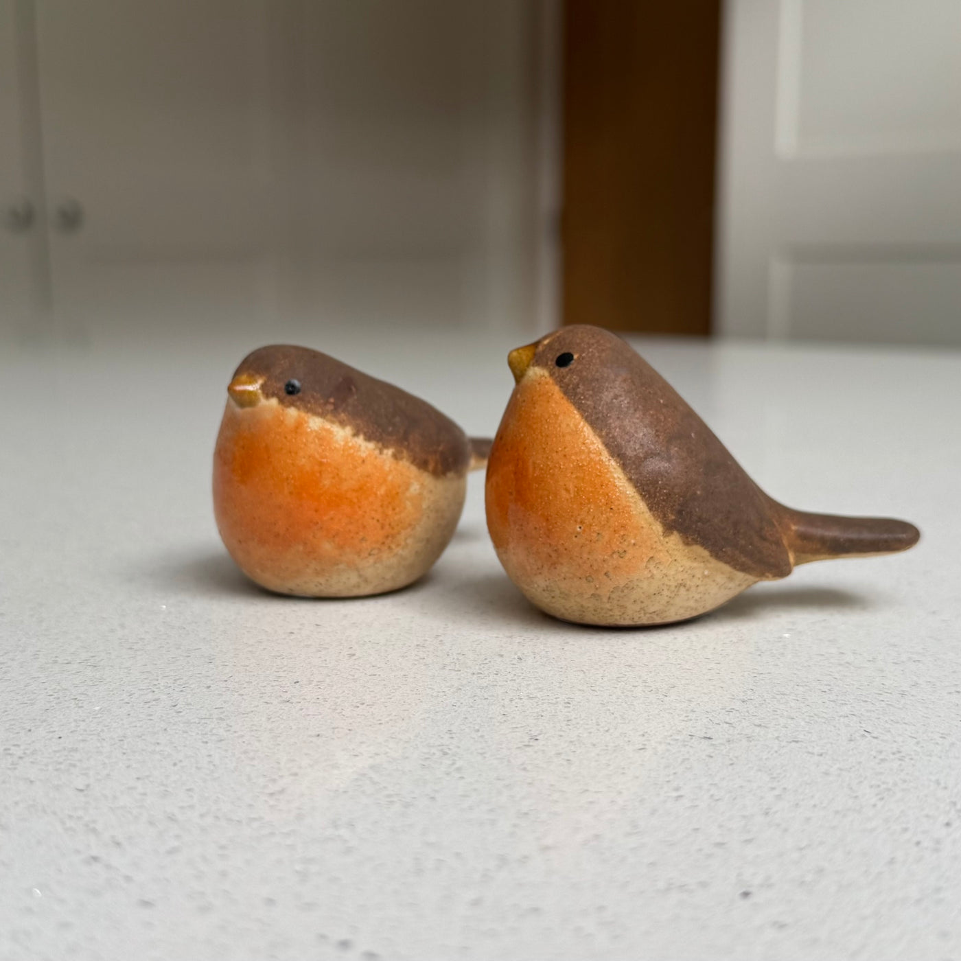 Small upright orange-breasted ceramic robin