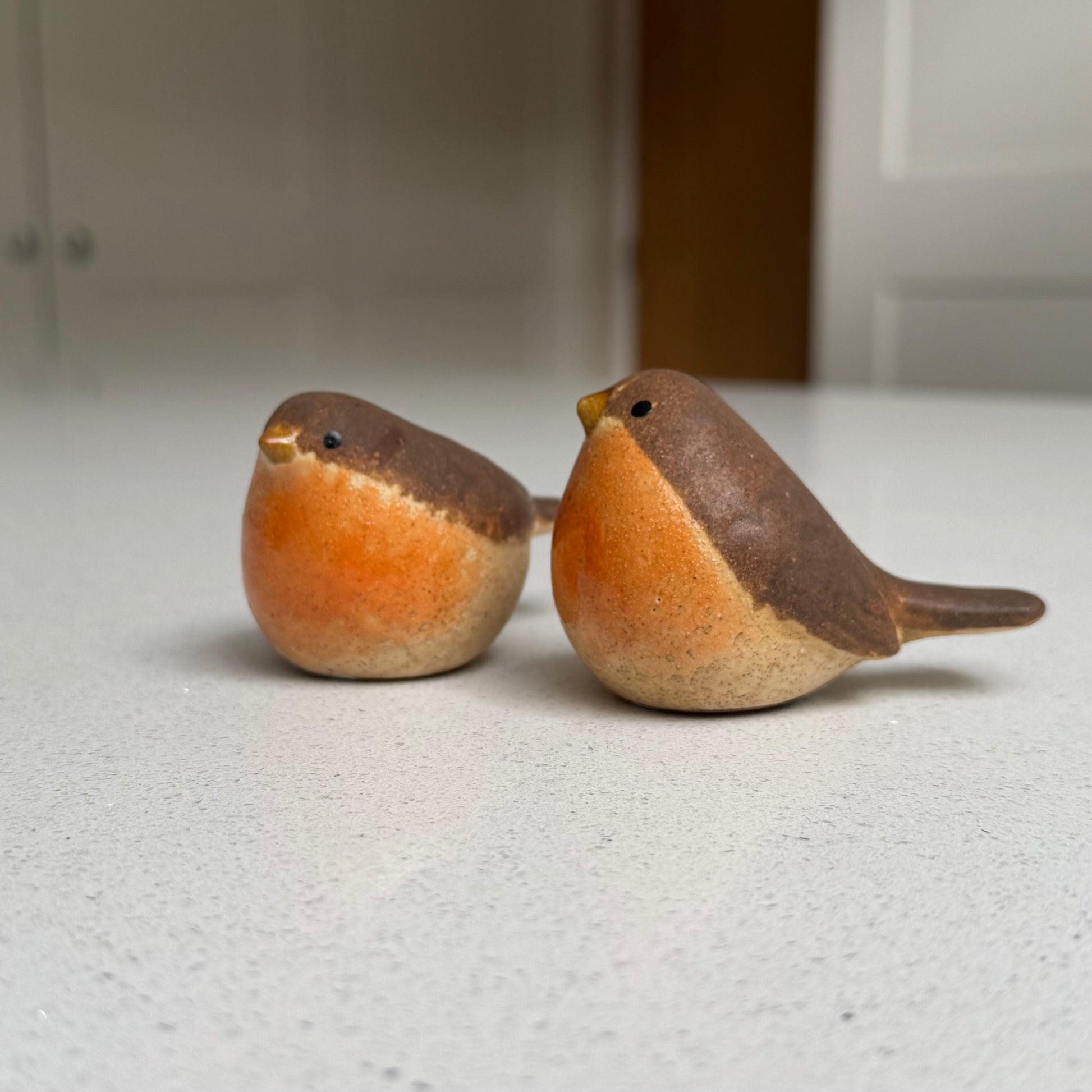 Small upright orange-breasted ceramic robin