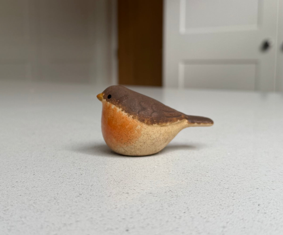 Handmade ceramic robin pair for woodland Christmas styling