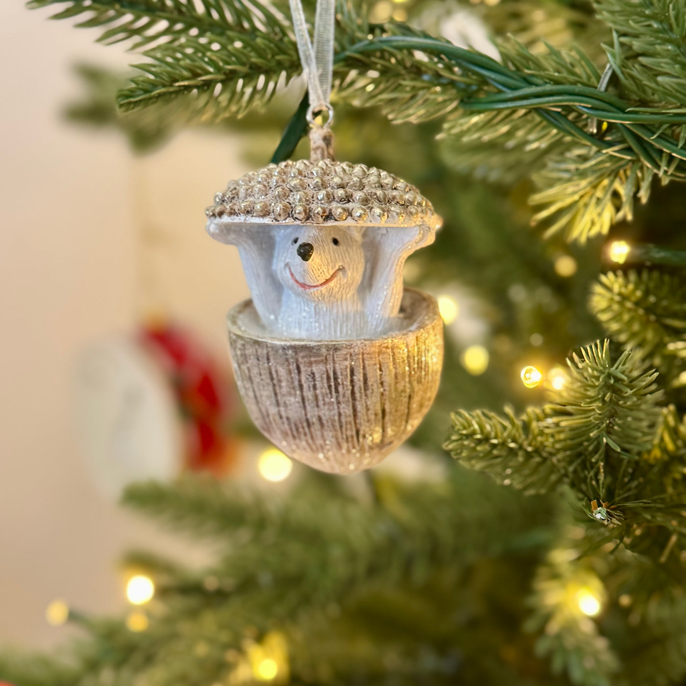 Hedgehog in an Acorn Christmas bauble – Natural