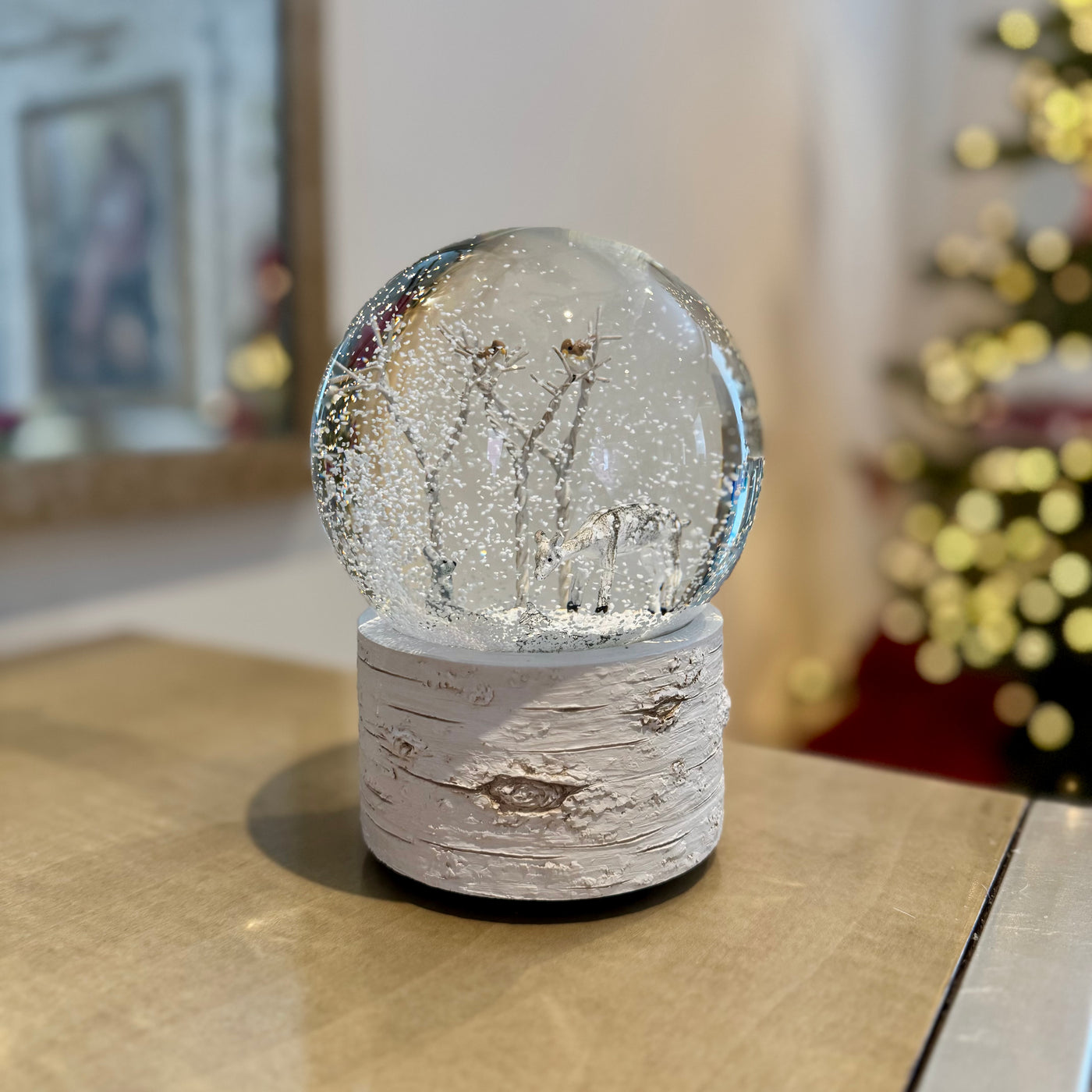 Musical woodland snow globe with textured bark-style base
