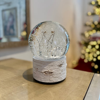 Musical woodland snow globe with textured bark-style base