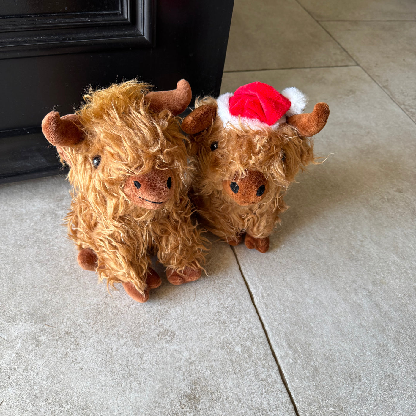 Sitting Highland Cow Doorstop – 23cm