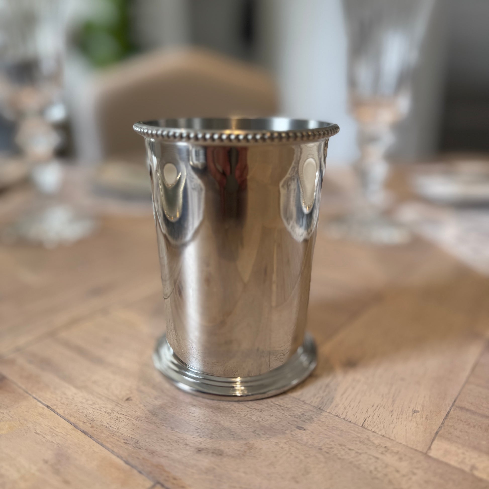 Decorative polished pewter cup for small stems and home displays