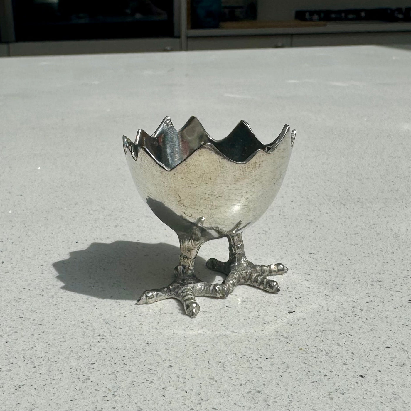 Handcrafted pewter egg cup with sculptural chick feet