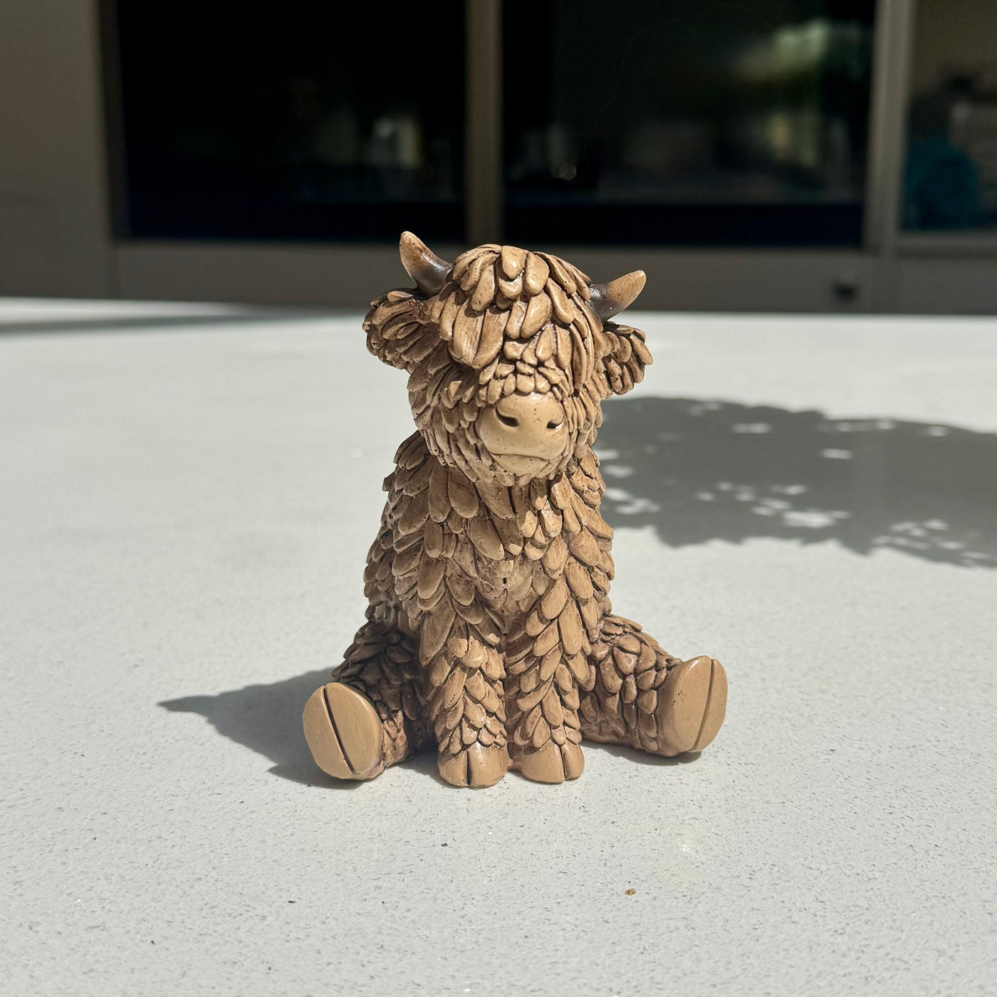 Sitting Highland Cow Ornament