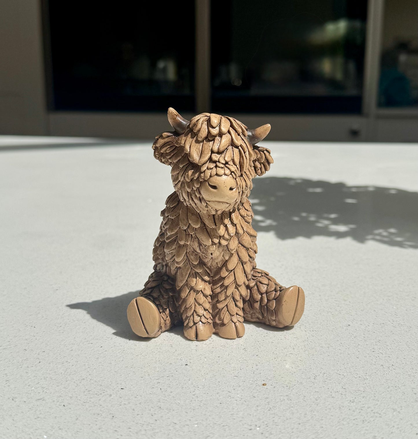 Sitting Highland Cow Ornament