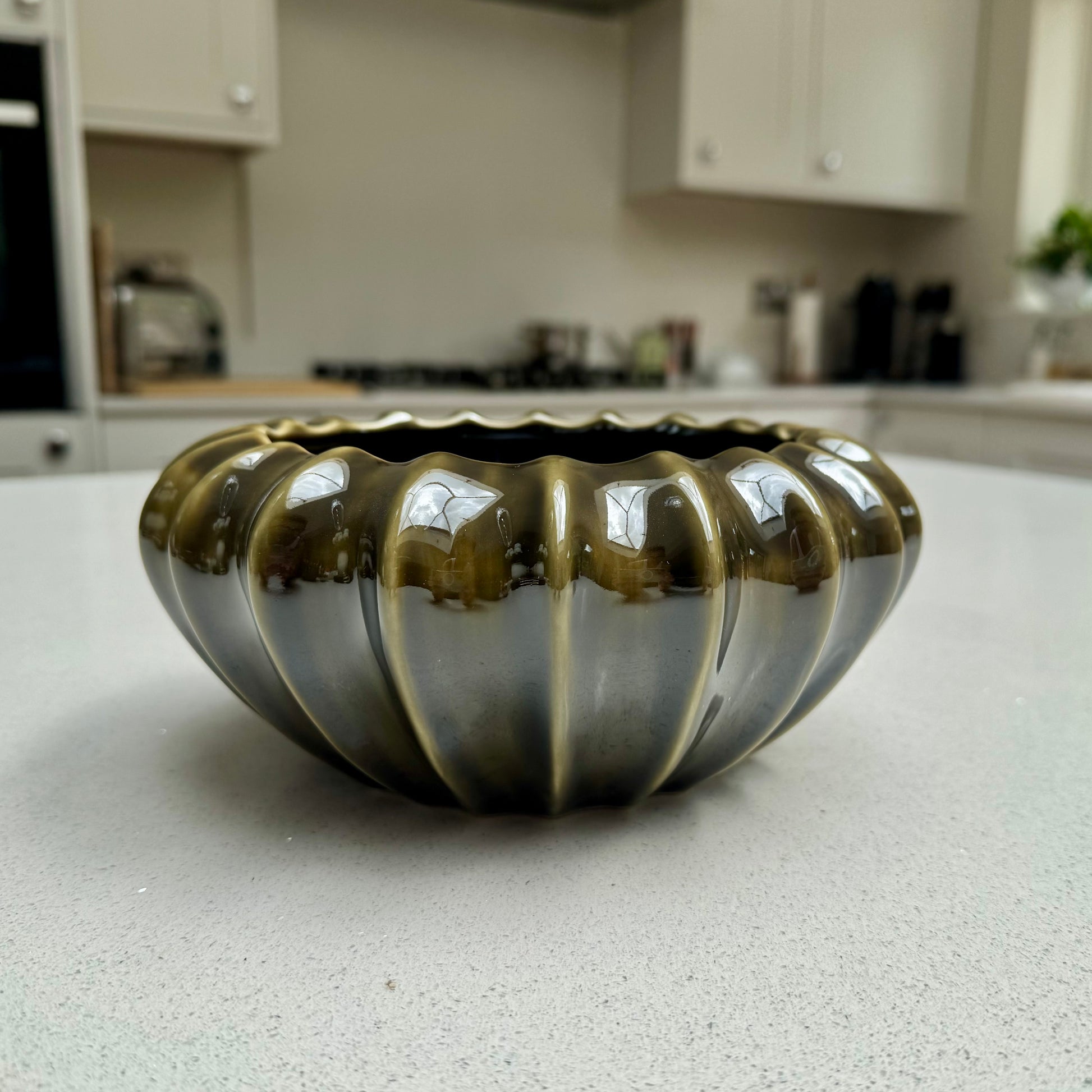Ridged olive ceramic bowl vase for table styling
