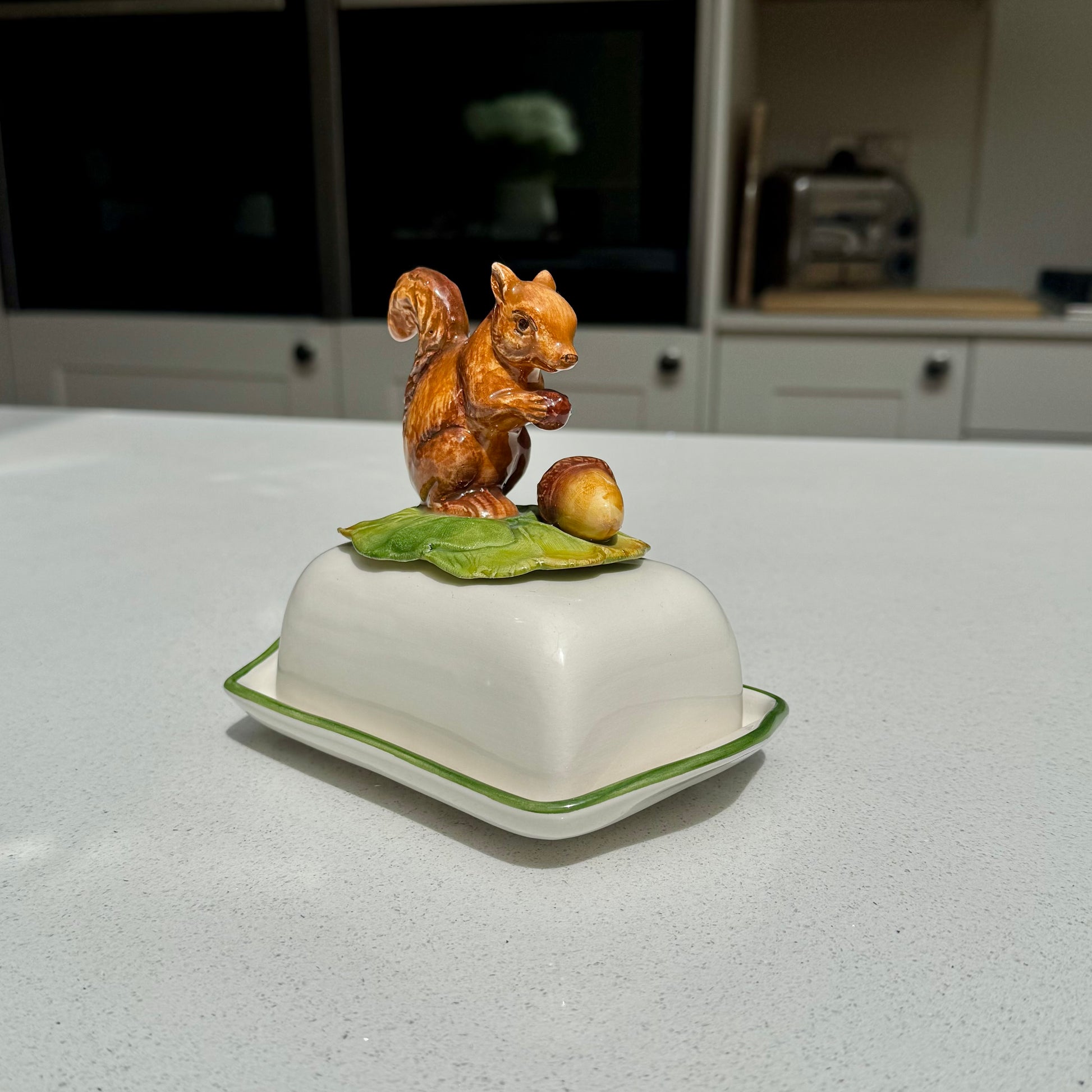 Ceramic butter dish with squirrel and acorn lid