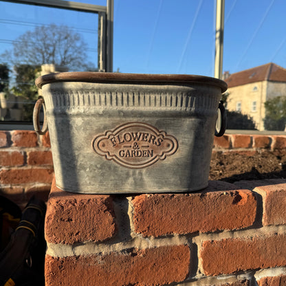 Oblong galvanised metal planter for herbs and flowers