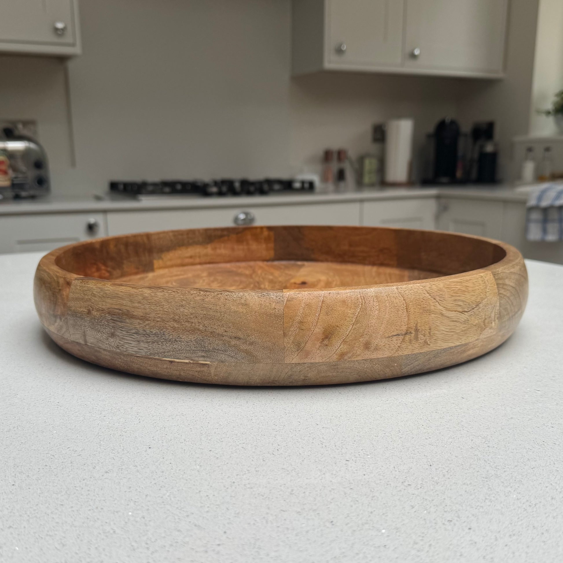 Handcrafted wooden tray showing natural grain and knots