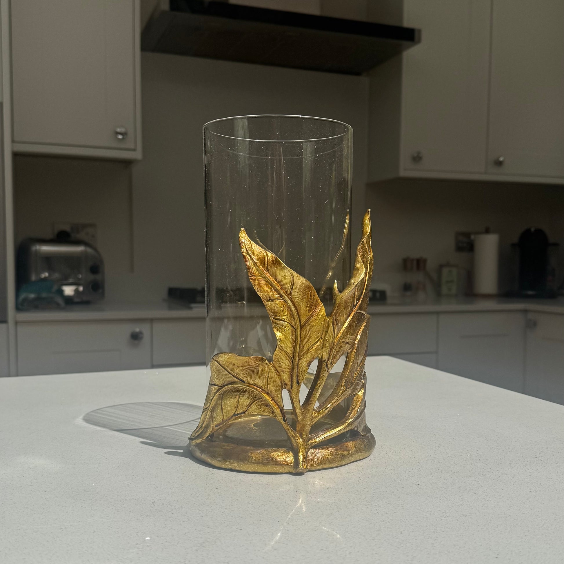 Decorative gold leaf glass candle holder for table styling