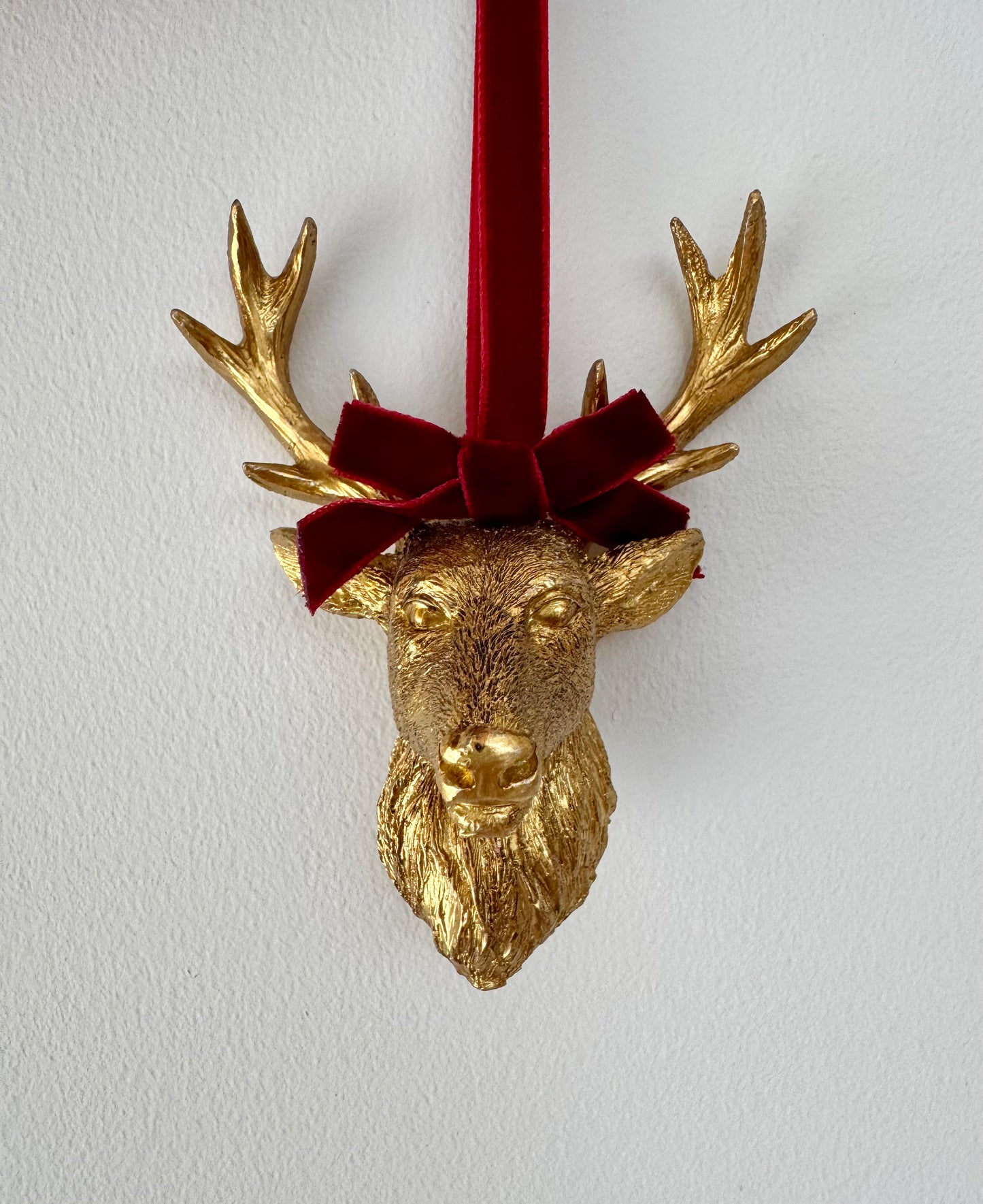 Gold Resin Stag Head Bauble with Red Velvet Bow