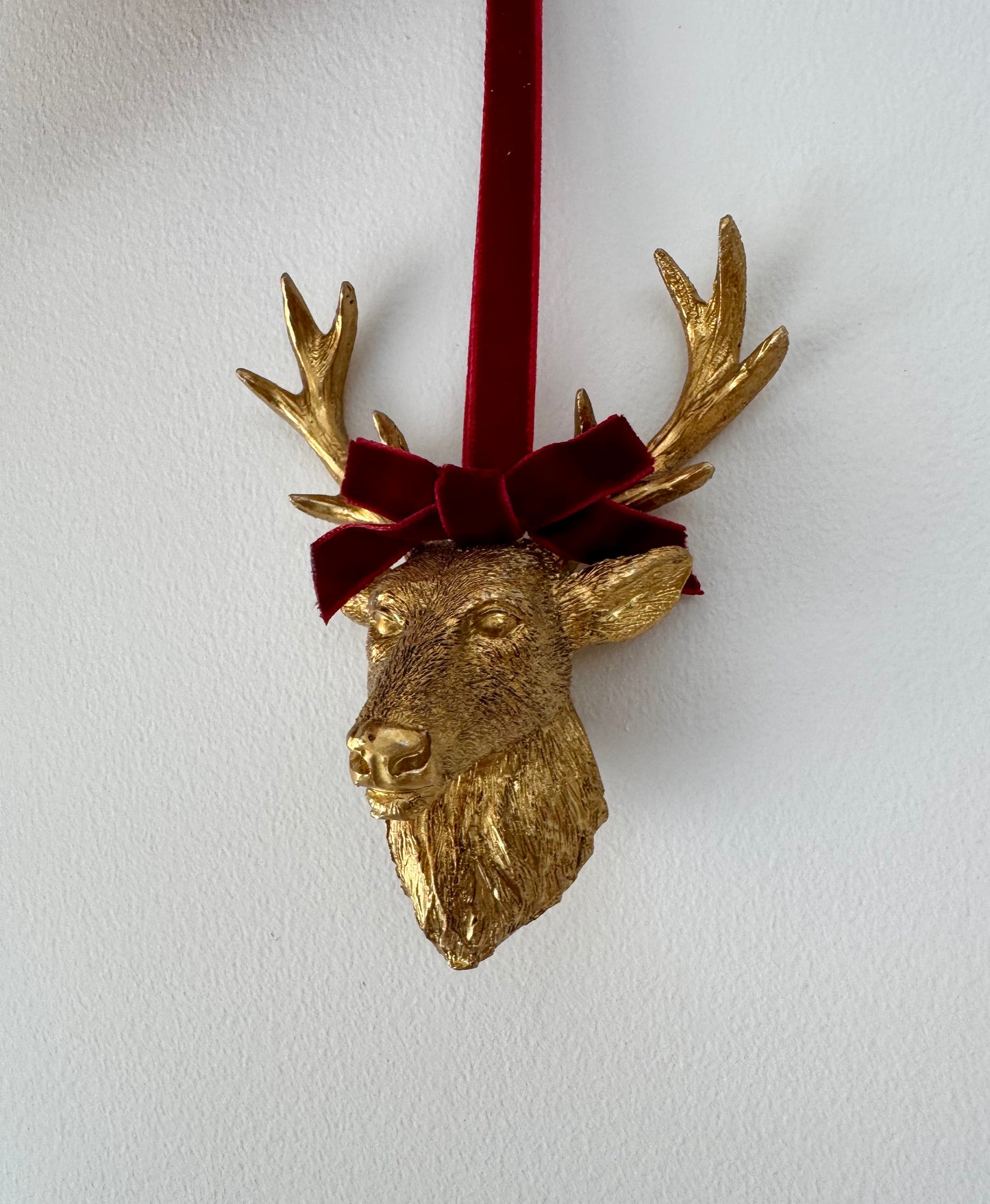 Gold Resin Stag Head Bauble with Red Velvet Bow