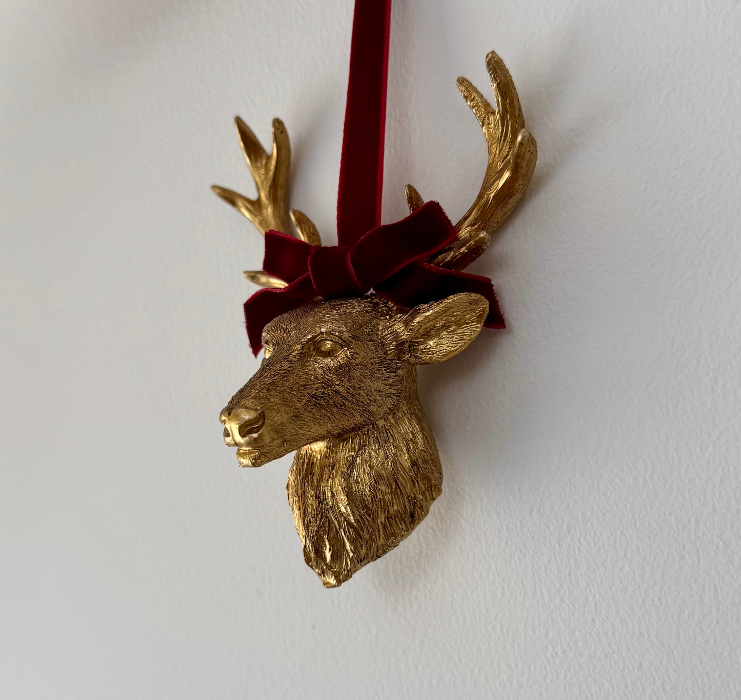 Gold Resin Stag Head Bauble with Red Velvet Bow