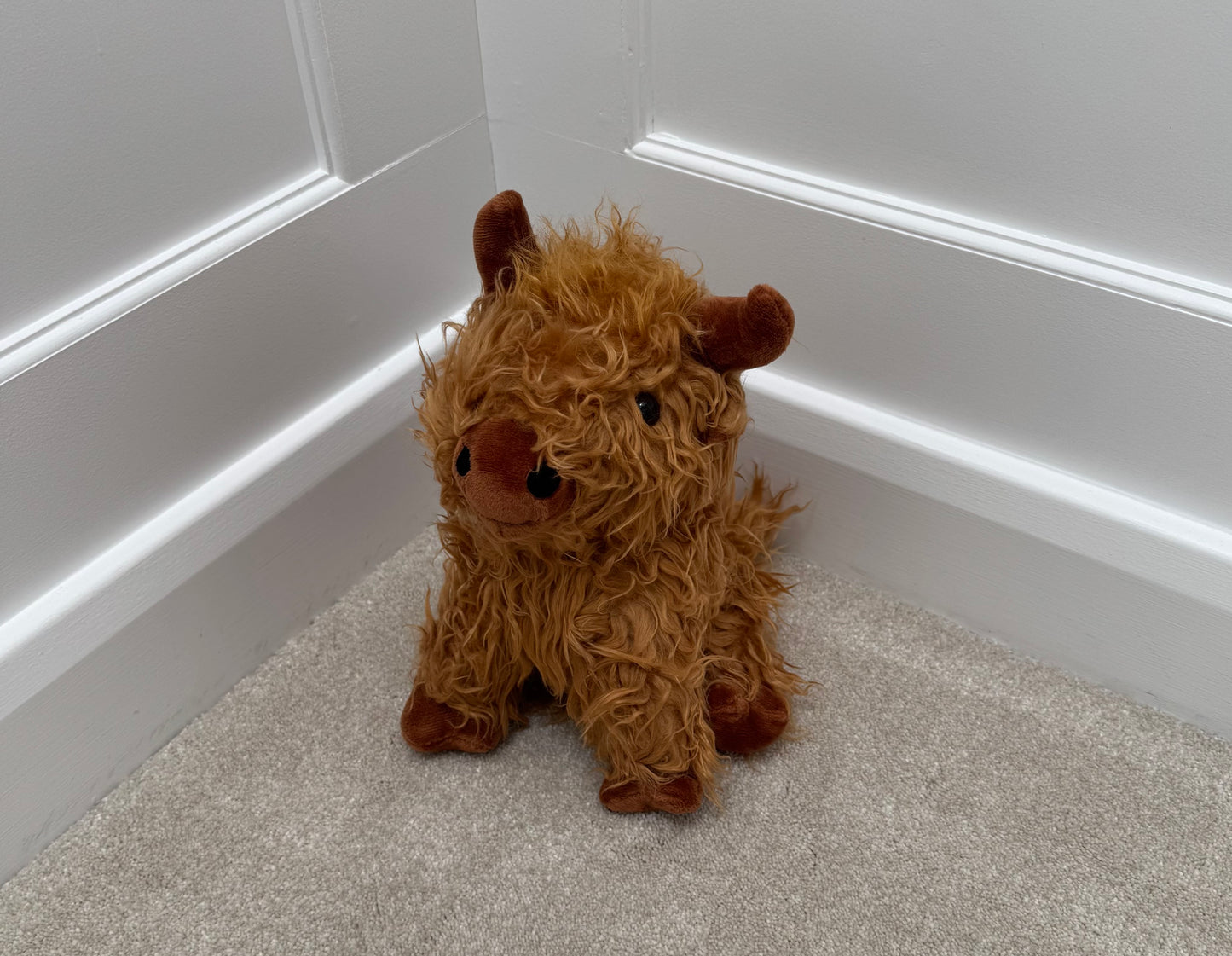 Sitting Highland Cow Doorstop – 23cm