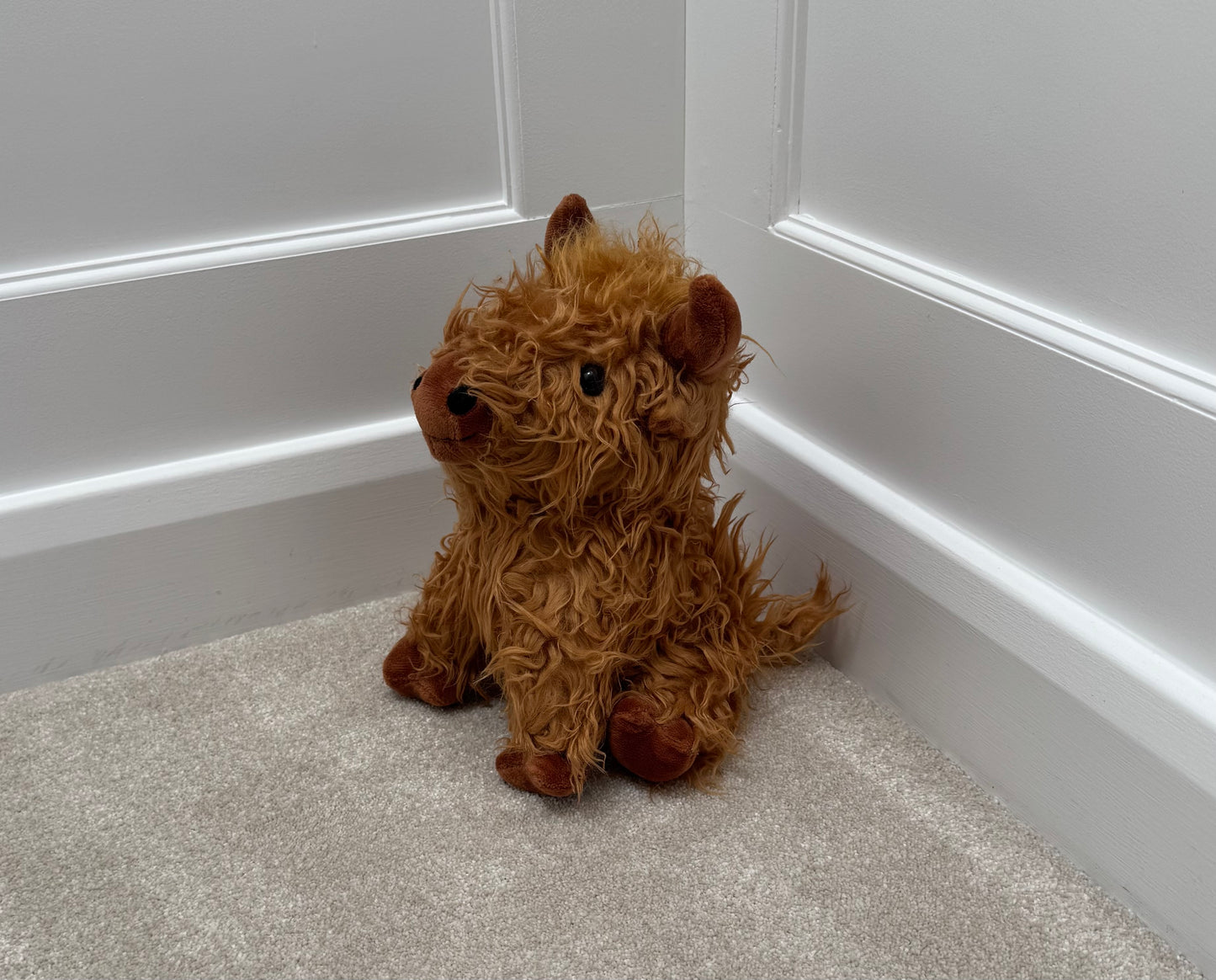 Sitting Highland Cow Doorstop – 23cm