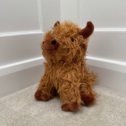 Sitting Highland Cow Doorstop – 23cm