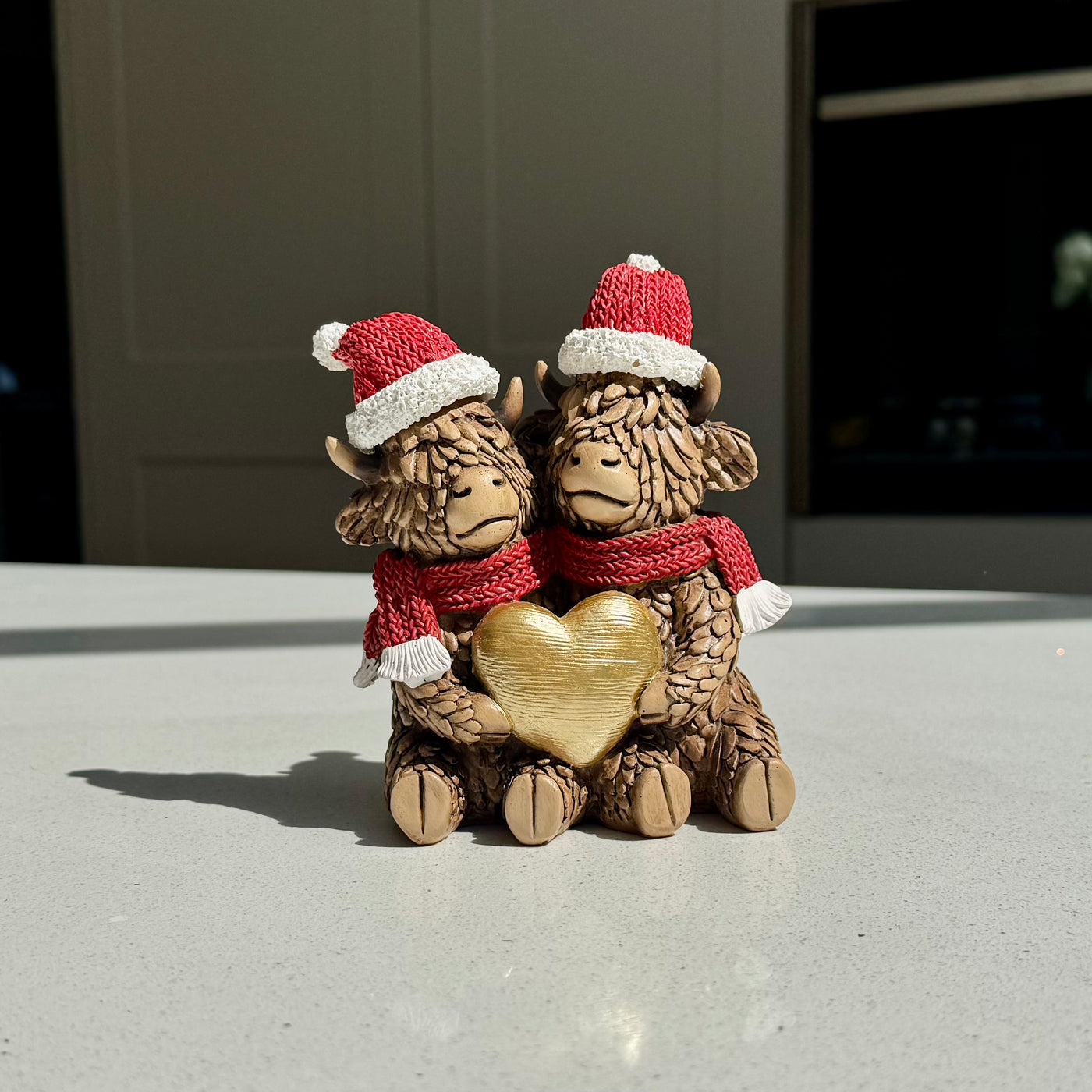 Festive Highland Cow Couple Figurine with Gold Heart
