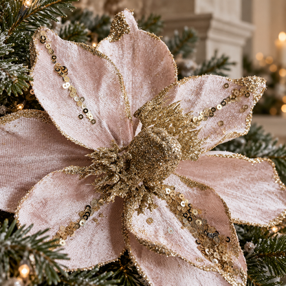 Detail of the blush velvet poinsettia's gold glittered centre, sequins and layered pink petals.