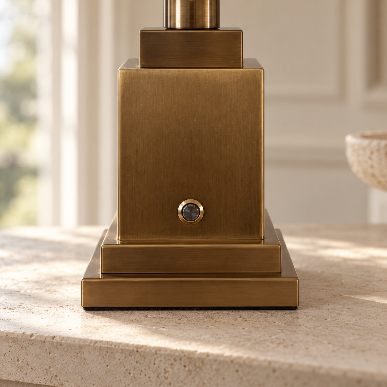 gold lamp base and circular control button detail