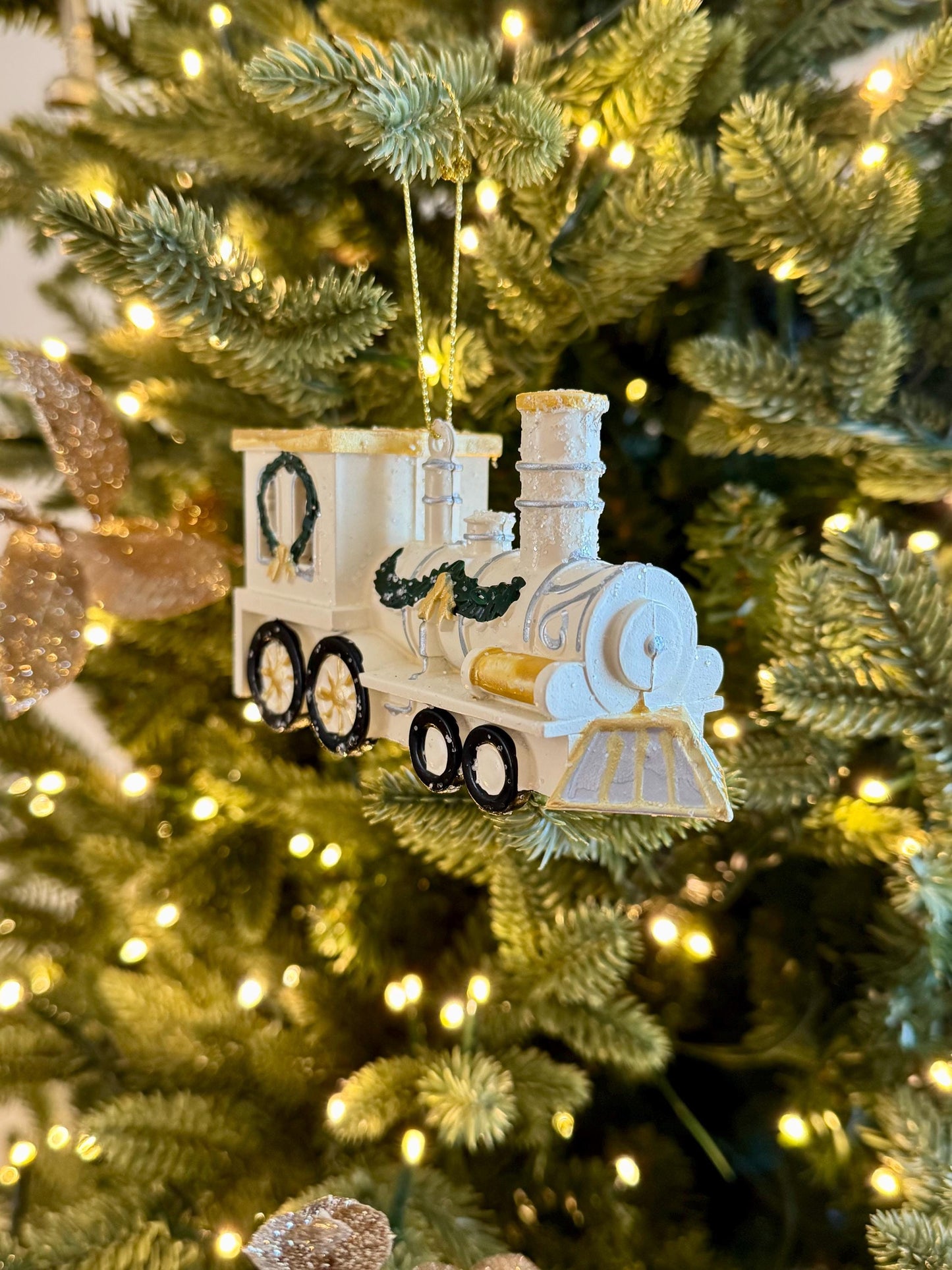White & Gold Train Bauble - Festive locomotive ornament with green garland detail