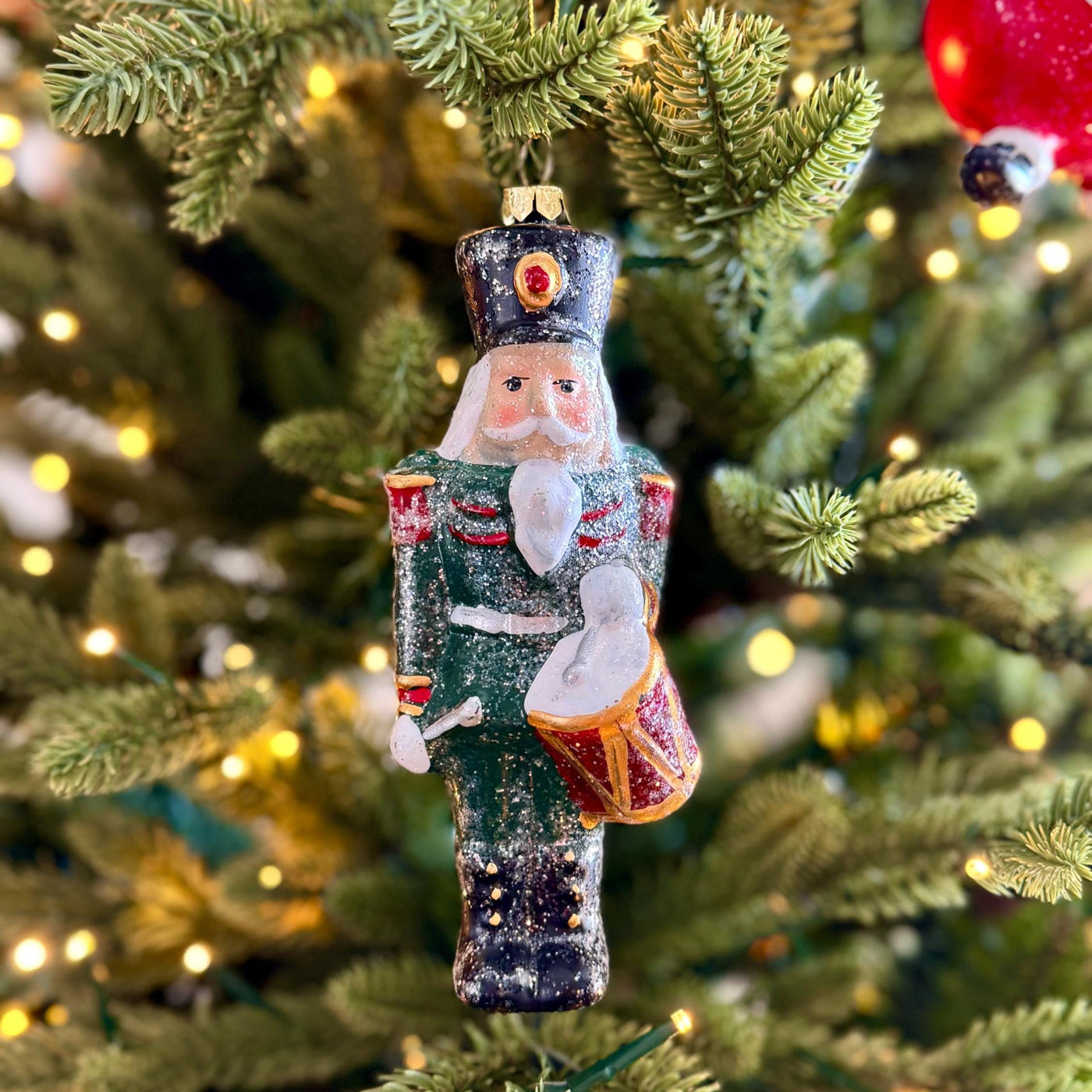 Nutcracker Drummer Christmas Bauble in Glittery Green