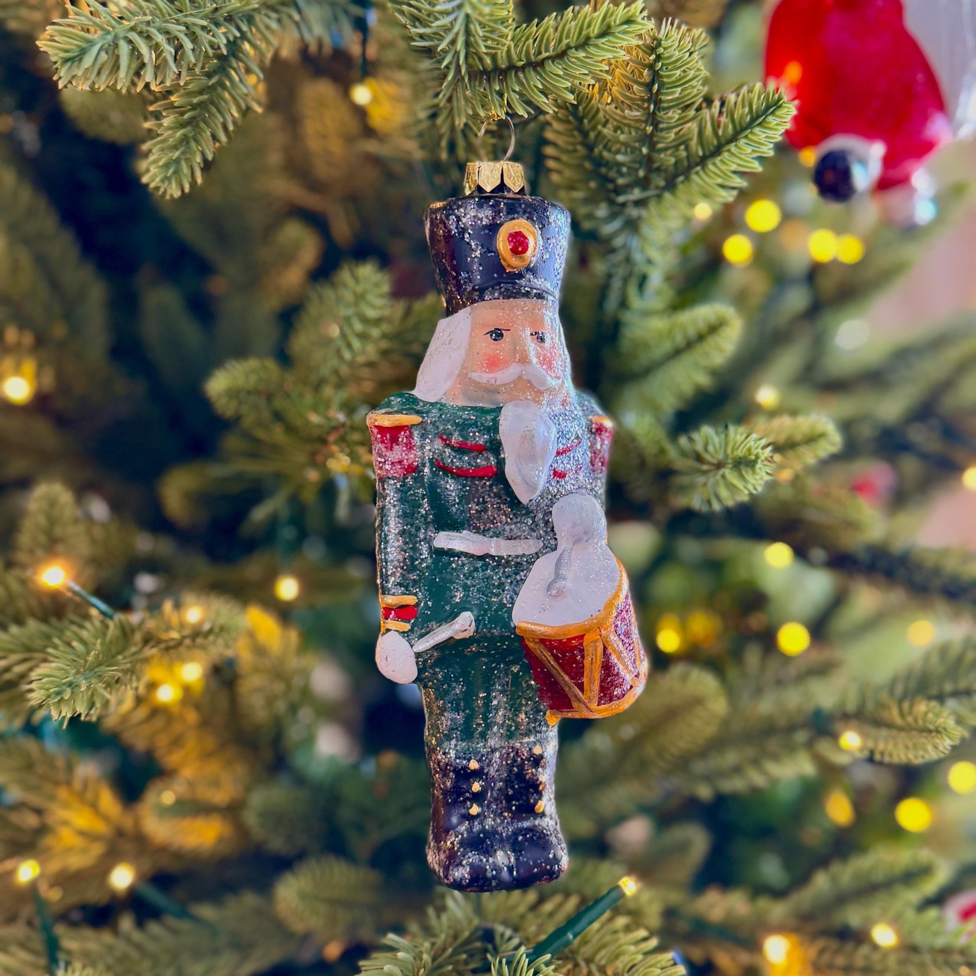 Nutcracker Drummer Christmas Bauble in Glittery Green