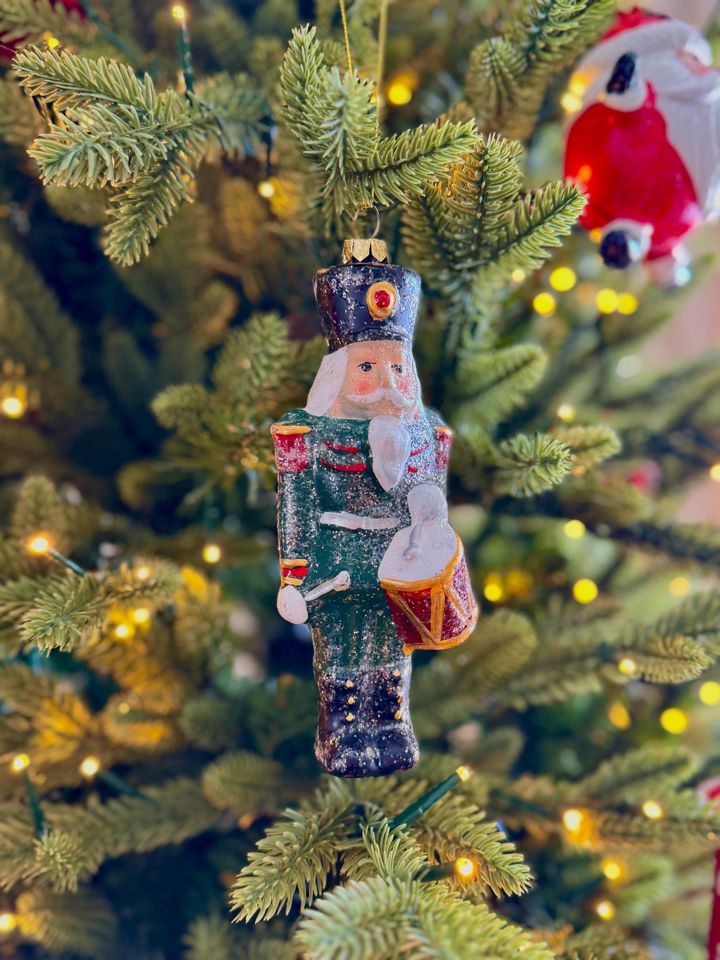Nutcracker Drummer Christmas Bauble in Glittery Green