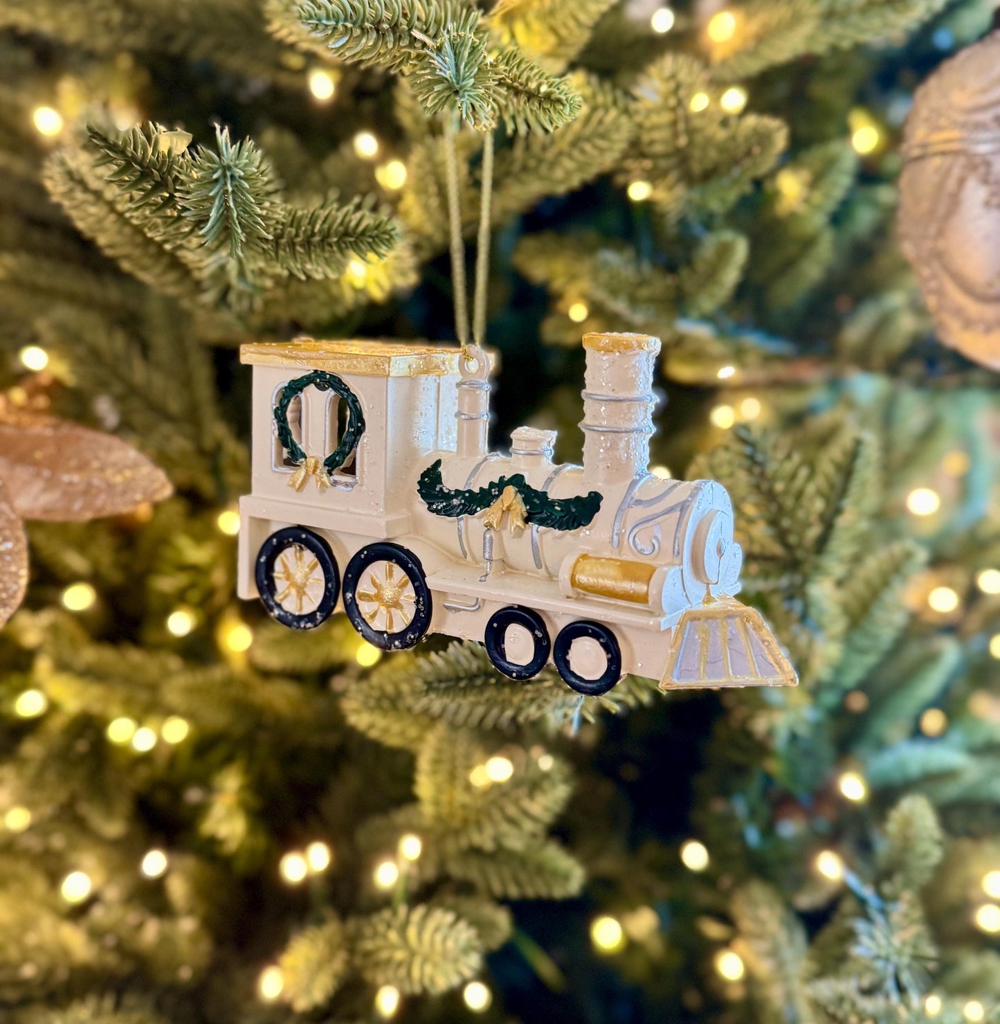 White & Gold Train Bauble - Festive locomotive ornament with green garland detail